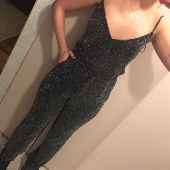 black and silver sparkly jumpsuit